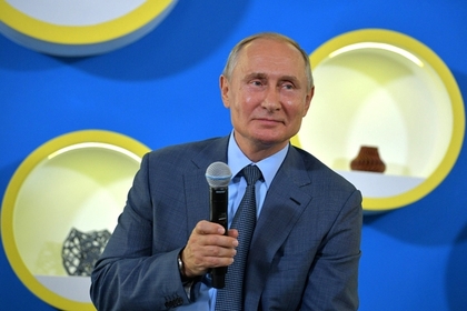 Путин порассуждал о деловых костюмах