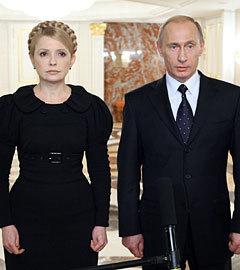 Юлия Тимошенко и Владимир Путин, январь 2009 года. Фото РИА Новости, Алексей Дружинин