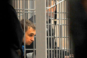 Дмитрий Коновалов и Владислав Ковалев, 30 ноября 2011 года. Фото (c)AFP