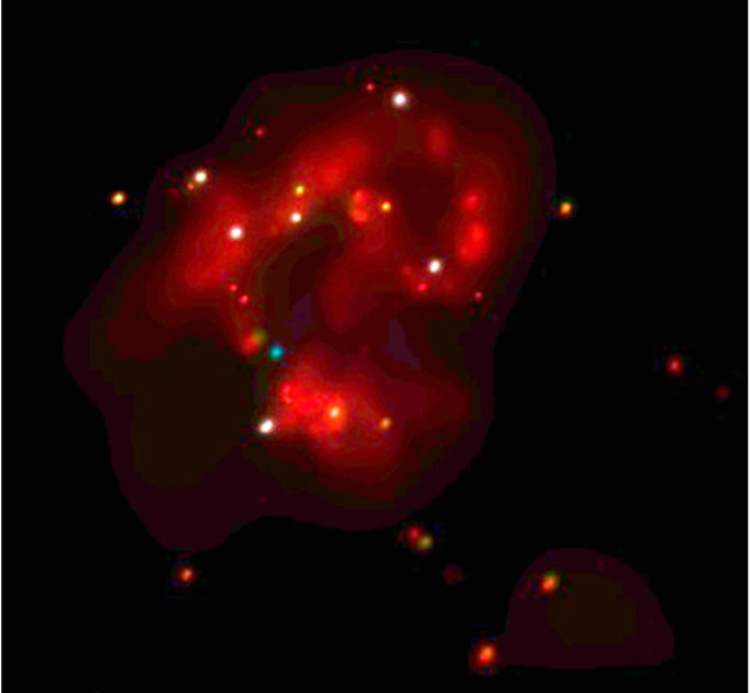 Изображение центральной части взаимодействующих галактик, полученное рентгеновской обсерваторией «Чандра». Некоторые из ярких точечных источников на этом снимке являются ультрамощными рентгеновскими источниками