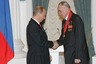 Президент России Владимир Путин (слева) и Геннадий Денежкин