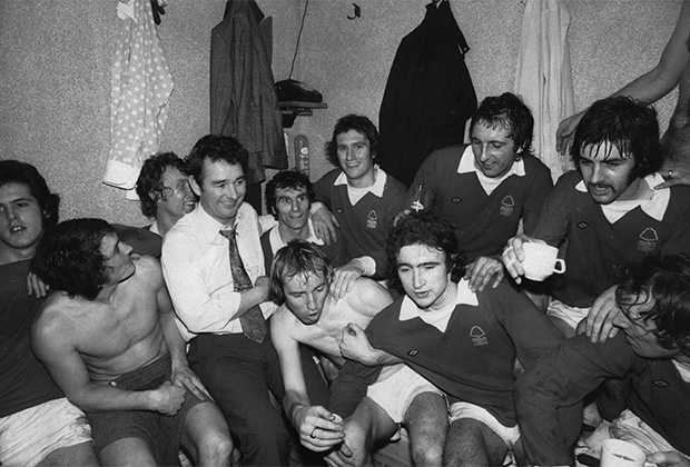 Nottingham Forest manager Brian Clough (1935 - 2004, centre, left) with his team in the dressing room after their 1-0 victory over Tottenham Hotspur in an FA Cup Third Round Replay at White Hart Lane, London, 8th January 1975. This was Clough's first game in charge as Nottingham Forest manager. (Photo by Michael Fresco/Evening Standard/Hulton Archive/Getty Images)