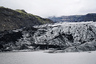 Ледник Сольхеймайокюдль на юге Исландии, до сих пор покрытый пеплом от извержения вулкана в 2010 году