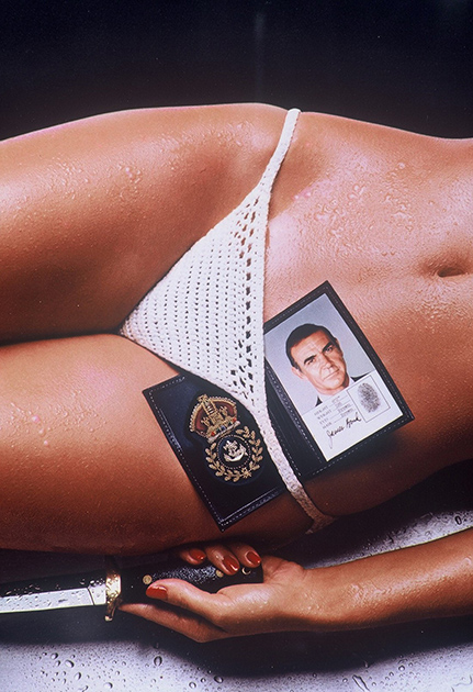 Голд работал над плакатами нескольких фильмов Бондианы — и, пожалуй, в процессе отменил несколько профессиональных табу: так, большой скандал вызвал его постер к «Только для твоих глаз» (с раздвинутыми ногами девушки в бикини, из-под которых выглядывал Коннери-Бонд). Недалеко ушел и постер к «Никогда не говори никогда», также подчеркивающий талант агента 007 по части соблазнения.