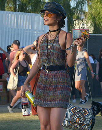 Indio, CA  - Coachella queen, Vanessa Hudgens, is spotted as she looks at her map to navigate the Polo Fields. She keeps it Boho while enjoying weekend 2.

