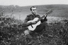 Рядовой Иосиф Кобзон играет на гитаре. 1958 год.