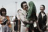 Певец Иосиф Кобзон (с девочкой на руках) выступает на стадионе в Кабуле. Май 1985 года. В то время в стране разворачивалась афганская война.