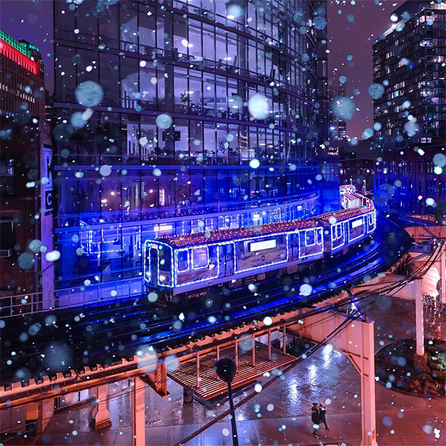 Падающий снег делает изображение подсвеченного едущего поезда по-настоящему праздничным и волшебным. Фотограф Дэвид Сова признался, что «ловил» подходящий для съемки момент почти полчаса.