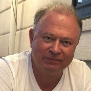 Андрей Караулов