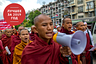 A Sri Lankan Buddhist monk shouts slogans outside the Indian High Commission to Sri Lanka during a protest in Colombo March 20, 2013. Buddhist monks protested since Tuesday against two separate attacks on Sri Lankan Buddhist monks who were in Chennai for education visits, and demanded the Indian government to take action on these attacks, according to the demonstrators. REUTERS/Dinuka Liyanawatte (SRI LANKA - Tags: POLITICS CIVIL UNREST RELIGION) - GM1E93K18HZ01