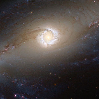 Сейфертовская галактика NGC 1097