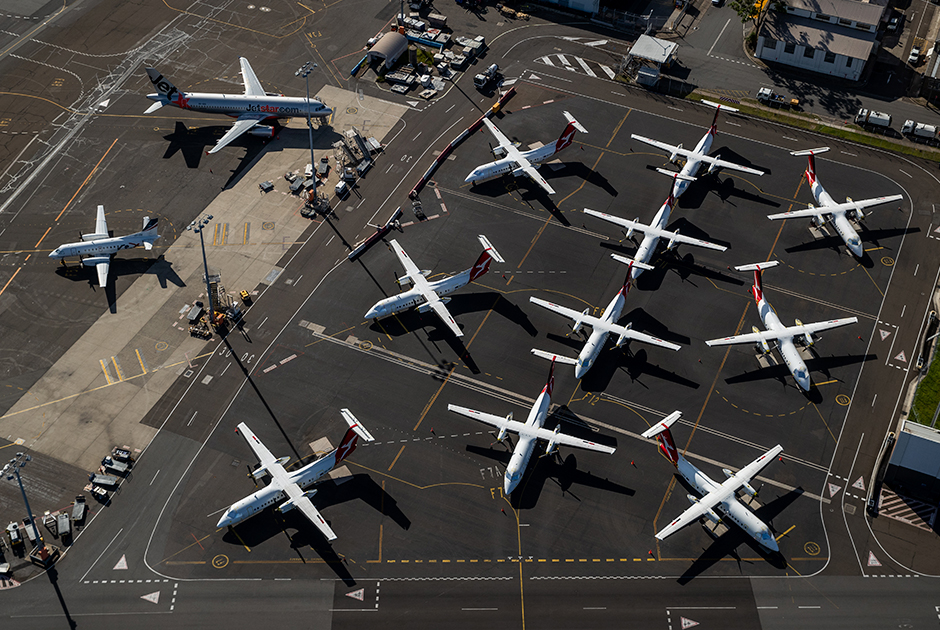 Припаркованные самолеты в аэропорту Сиднея
