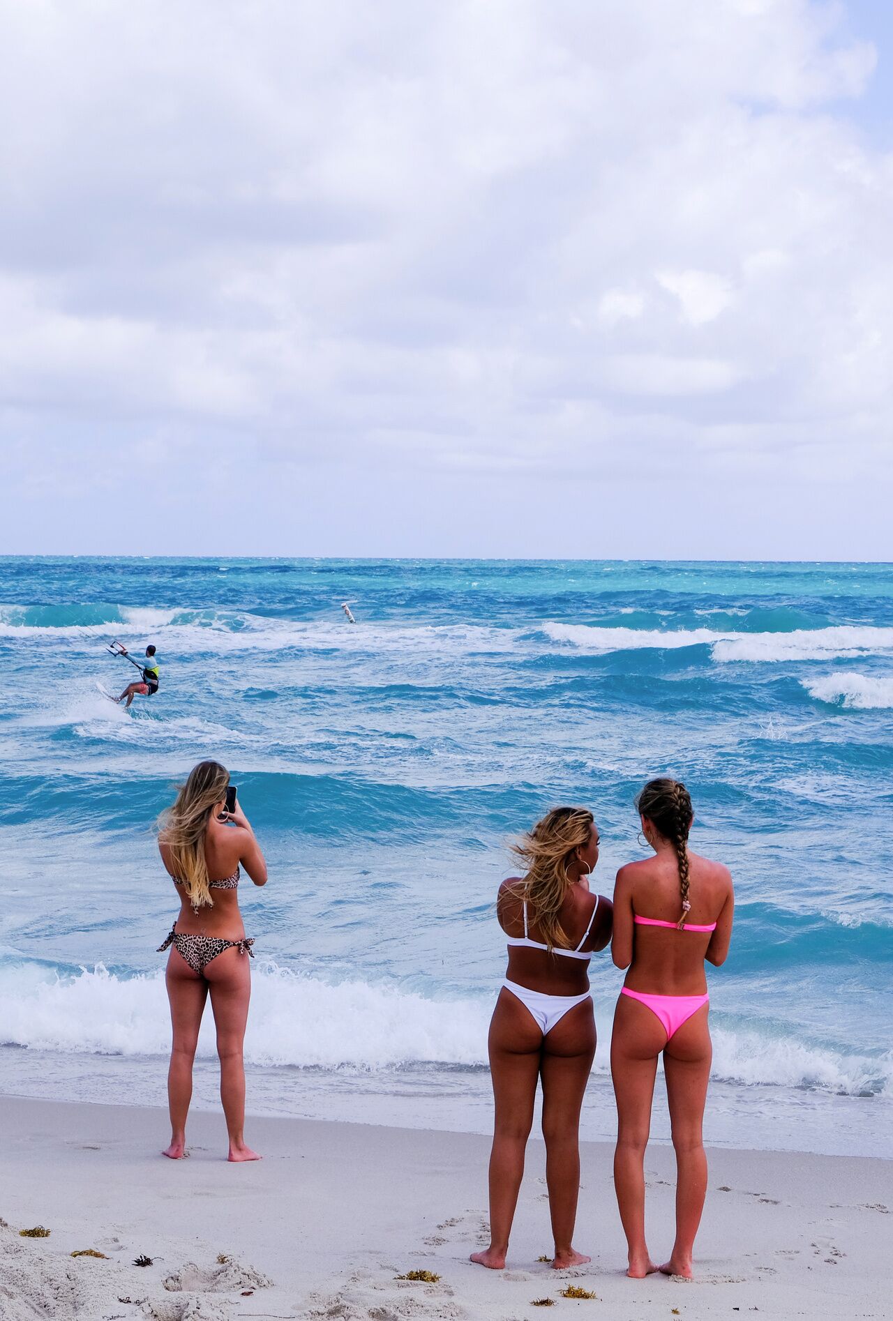 Women Looking At Naked Men On Beach