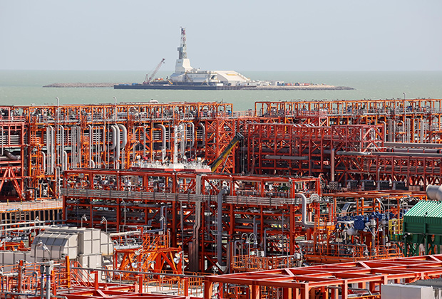 An oil rig (rear) and infrastructure of D Island, the main processing hub, are pictured at the Kashagan offshore oil field in the Caspian sea in western Kazakhstan August 21, 2013. To match Exclusive OIL-CASPIAN/ REUTERS