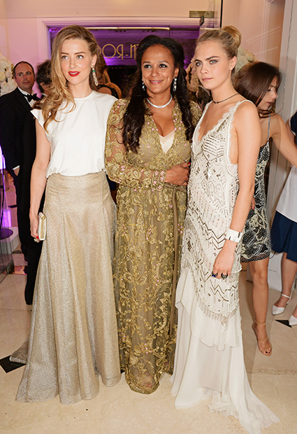 Американская актриса Эмбер Херд, Изабель душ Сантуш и британская супермодель Кара Делевинь на светском мероприятии в рамках Каннского кинофестиваля, 20 мая 2014 года