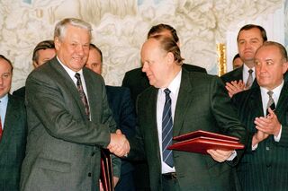 Russian President Boris Yeltsin and Byelorussian leader Stanislav Shushkevich, exchange Slavic Treaty in Brest, USSR (Russian Federation) Dec. 7, 1991.