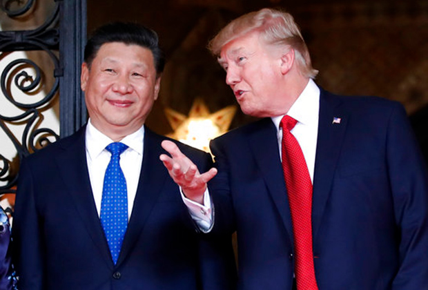 Китайский лидер Си Цзиньпин (слева) и президент США Дональд Трамп