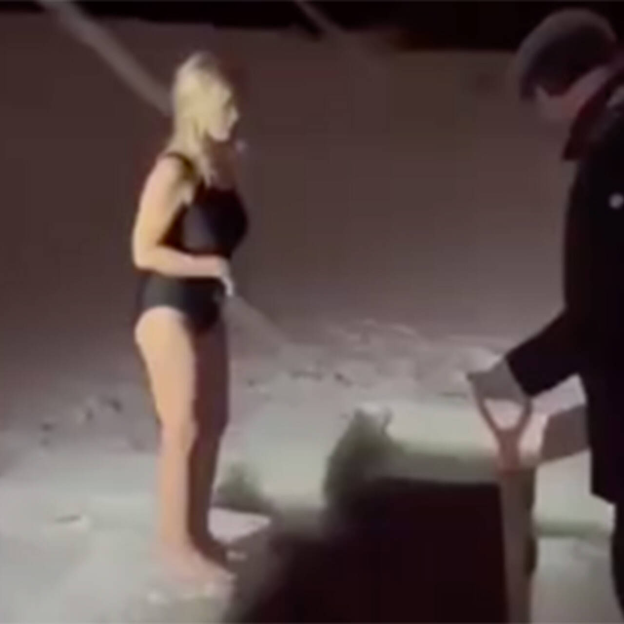 Russian Woman Disappears Under Ice