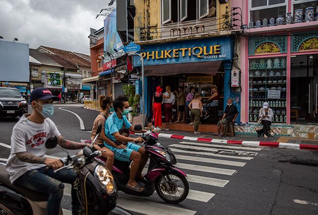 PHI PHI ISLAND, THAILAND - AUGUST 01: Sandbox travelers visit a popular coffee shop in Phuket Old Town on August 01, 2021 in Phuket, Thailand. Phuket Town remains a cultural center of Phuket, Thailand's largest island and the location of the Phuket 