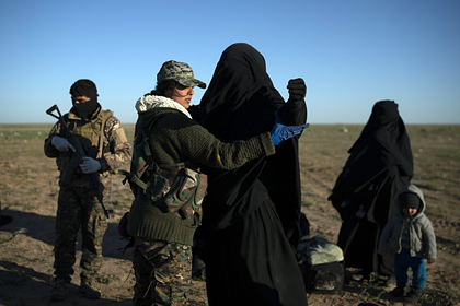 Уехавшая из России в Сирию жена боевика получила пять лет за участие в НВФ