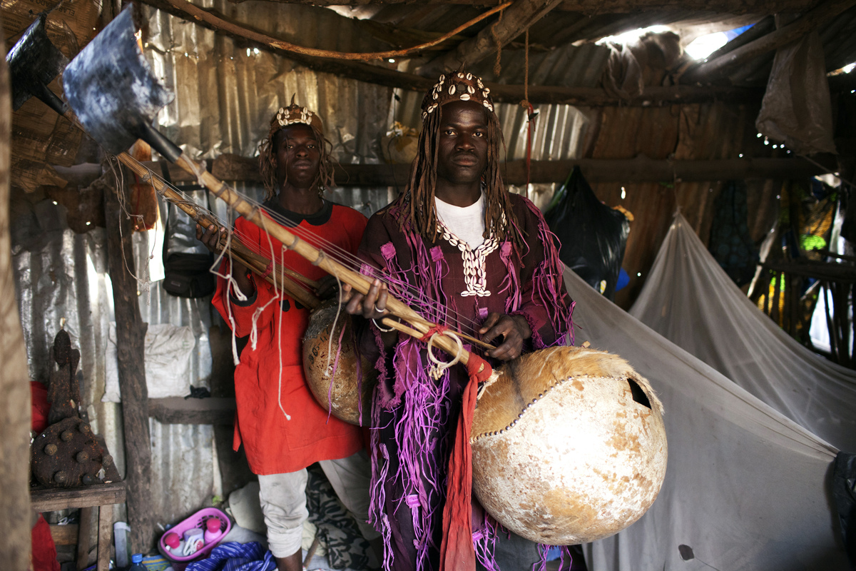 Traditional Donso musicians pose for a picture at their house in Bamako February 27, 2014. 