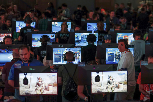 Gamers play Borderlands 3 by 2K at E3, the annual video games expo experience the latest in gaming software and hardware in Los Angeles, California
