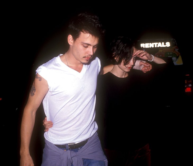 Johnny Depp and Winona Ryder during Herb Ritts Birthday Party 1990 in Los Angeles, California, United States. (Photo by Barry King/WireImage)