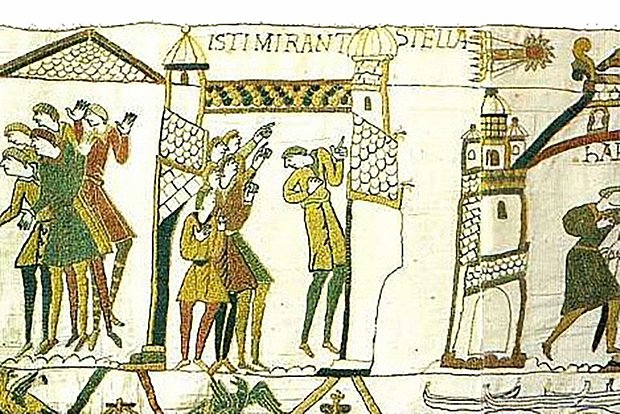 Люди дивятся на комету Галлея в 1066 году. Фрагмент гобелена из Байё, около 1080 года. Иллюстрация: ru.wikipedia.org