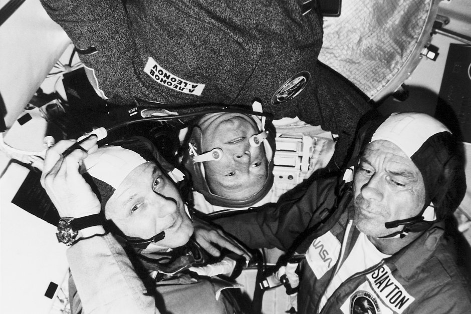 (Original Caption) 1975-Photo shows Astronaut Donald K. Slayton, Docking Module Pilot, Astronaut Thomas P. Stafford, American Crew Commander, and Cosmonaut Aleksey A. Leonov, Commander of the Soviet crew, inside the Apollo-Soyuz spacecraft, during the joint Russian-American space mission.