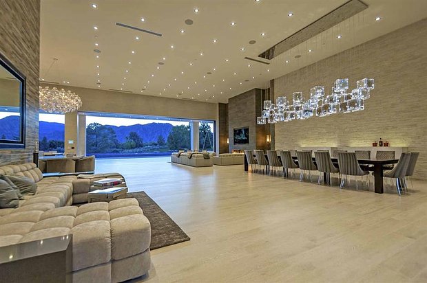 Kris Jenner's modern mansion
In August 2018, the family matriarch shelled out $12 million (£9.4m) for this minimalist mansion in La Quinta, in California's Coachella Valley. Built in 2016, the modern 
home offers seven bedrooms, 10 bathrooms and a whole host of enormous living spaces—the perfect spot for the ever-expanding Kardashian clan to spend time together. 
