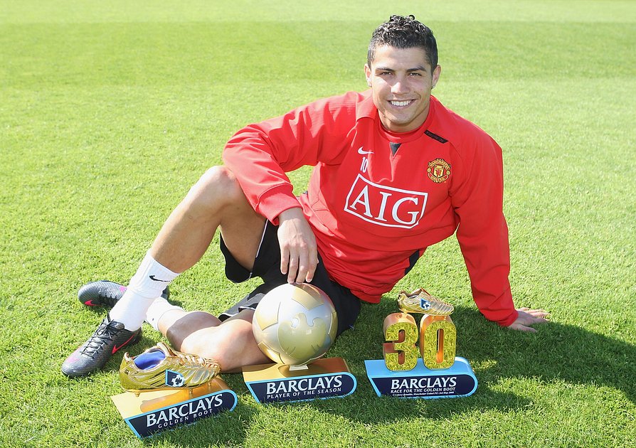 Cristiano Ronaldo of Manchester United poses with his Barclays Player of the Year, Golden Boot and 30 League Goals awards at Carrington Training Ground on May 14 2008, in Manchester, England