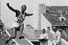 1st June 1936: Athlete Jesse Owens (1913 - 1980) flies through the air during the long jump event at the Olympic Games in Berlin. He won 4 gold medals and Hitler left the stadium to avoid having to congratulate a black competitor. 