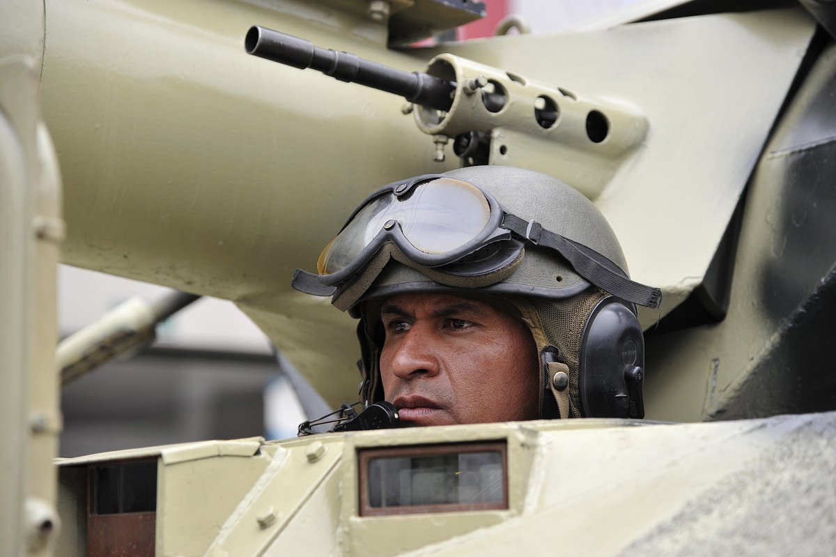 An Ecuadorian soldier in a tank