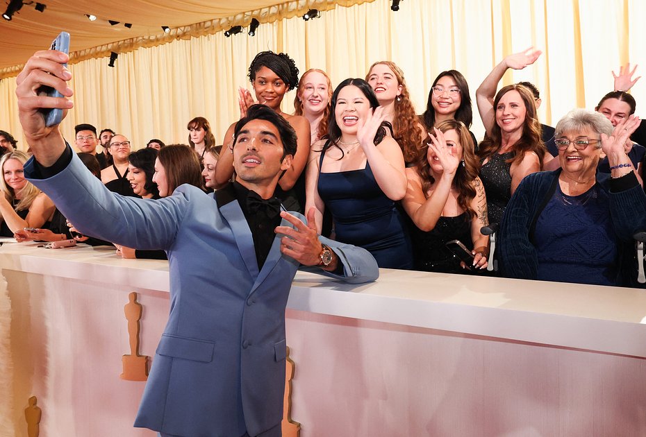 Taylor Zakhar Perez poses on the red carpet during the Oscars arrivals at the 96th Academy Awards in Hollywood, Los Angeles, California, U.S., March 10, 2024. 