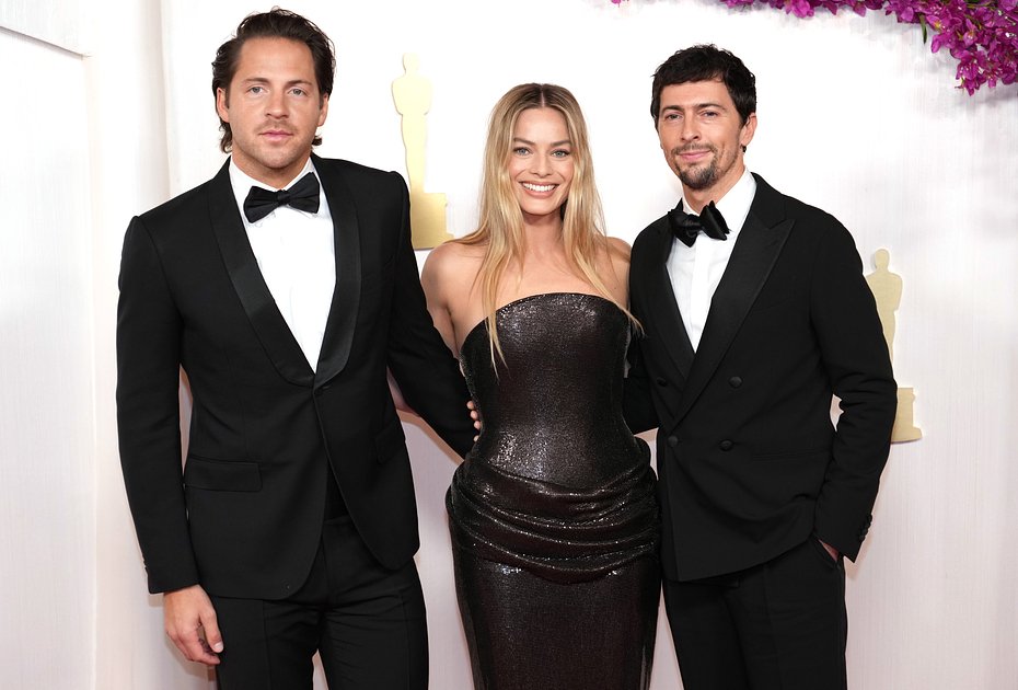 Tom Ackerley and Margot Robbie attend the 96th Annual Academy Awards at Dolby Theatre on March 10, 2024 in Hollywood, California. 