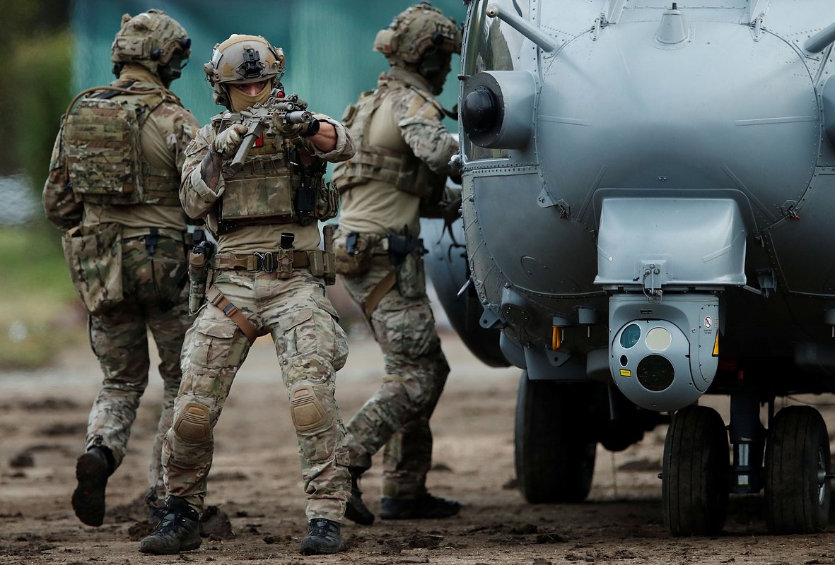 French soldiers board on an Airbus Helicopters H225M Caracal during a live mobility demonstration to present the France's military capabilities in Versailles, near Paris, France, October 8, 2020. 