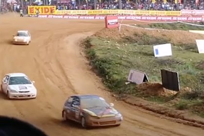 A racing car drove into a crowd of spectators at a competition