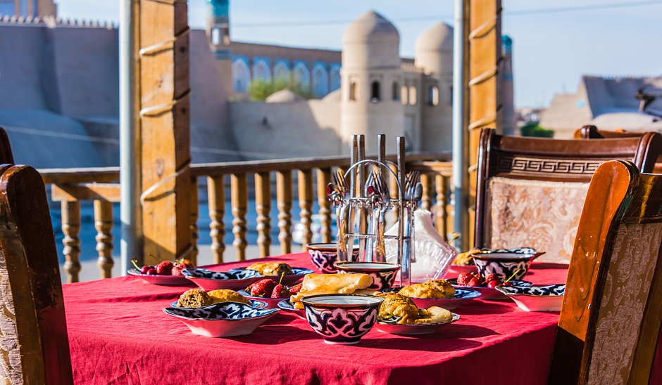 Traditional Uzbek breakfast served on the terrace.