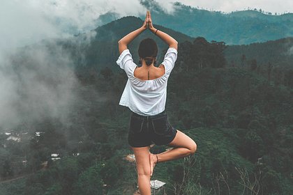 Fitness trainer explains the benefits of tree pose for the body