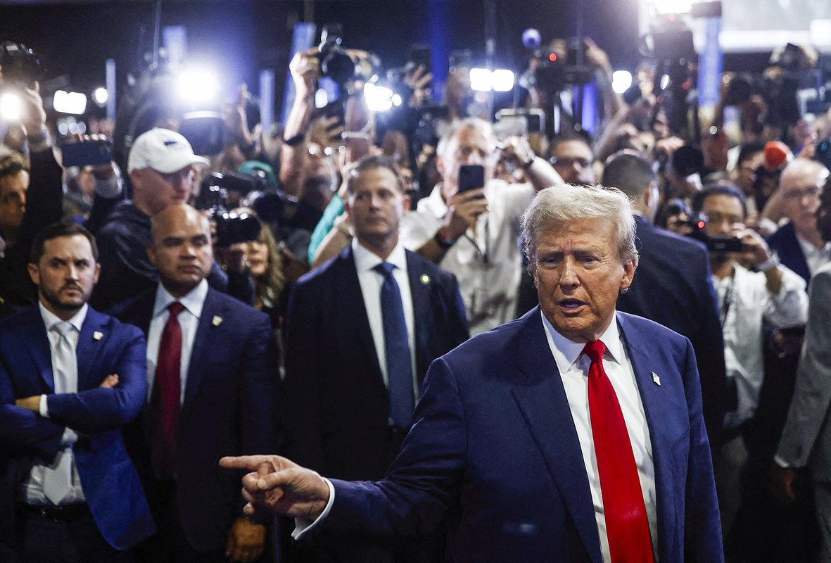 Republican presidential nominee and former U.S. President Donald Trump gestures in the spin room on the day of his debate with Democratic presidential nominee and U.S. Vice President Kamala Harris, in Philadelphia, Pennsylvania, U.S., September 10, 2024. 