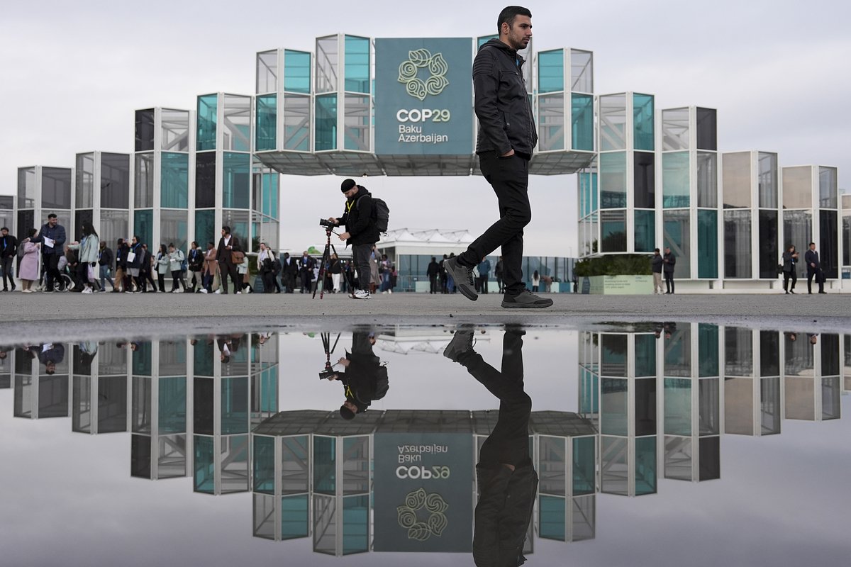 Люди прибывают на Климатический саммит ООН COP29, Азербайджан, 2024 год