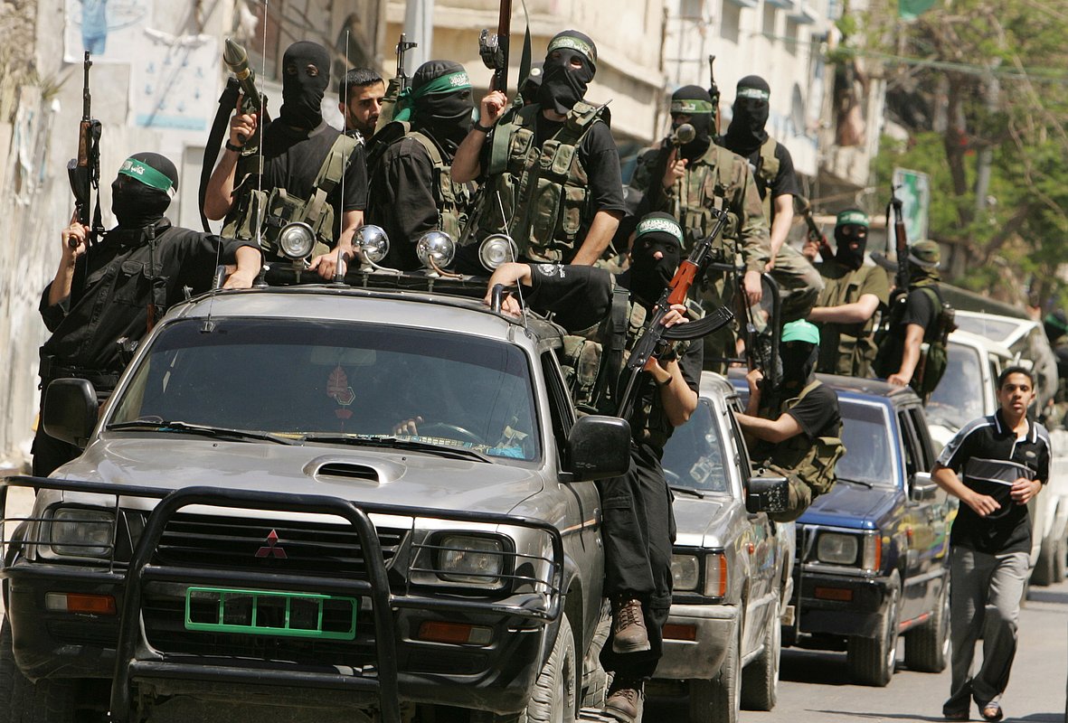 Palestinian militants from the Hamas movement patrol the street of Gaza city
 2006