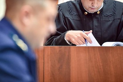 Россиянина осудили за публикацию фото с обвязанным Георгиевской лентой половым органом