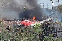 В Индии пассажирский самолет рухнул на дом, погибли сотни человек. Кадры с места катастрофы