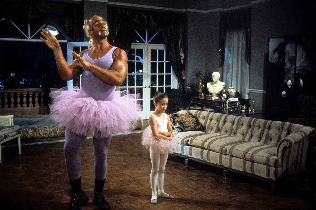 Hulk Hogan dances in a tutu in a scene from the film 'Mr. Nanny', 1993.