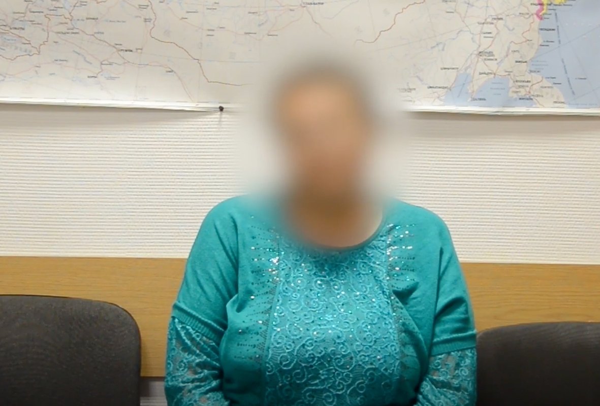 Подозреваемая в подрыве Транссиба на допросе.
