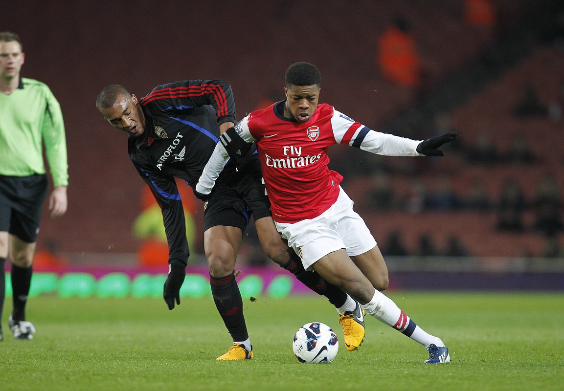 Лайонел Адамс (слева)