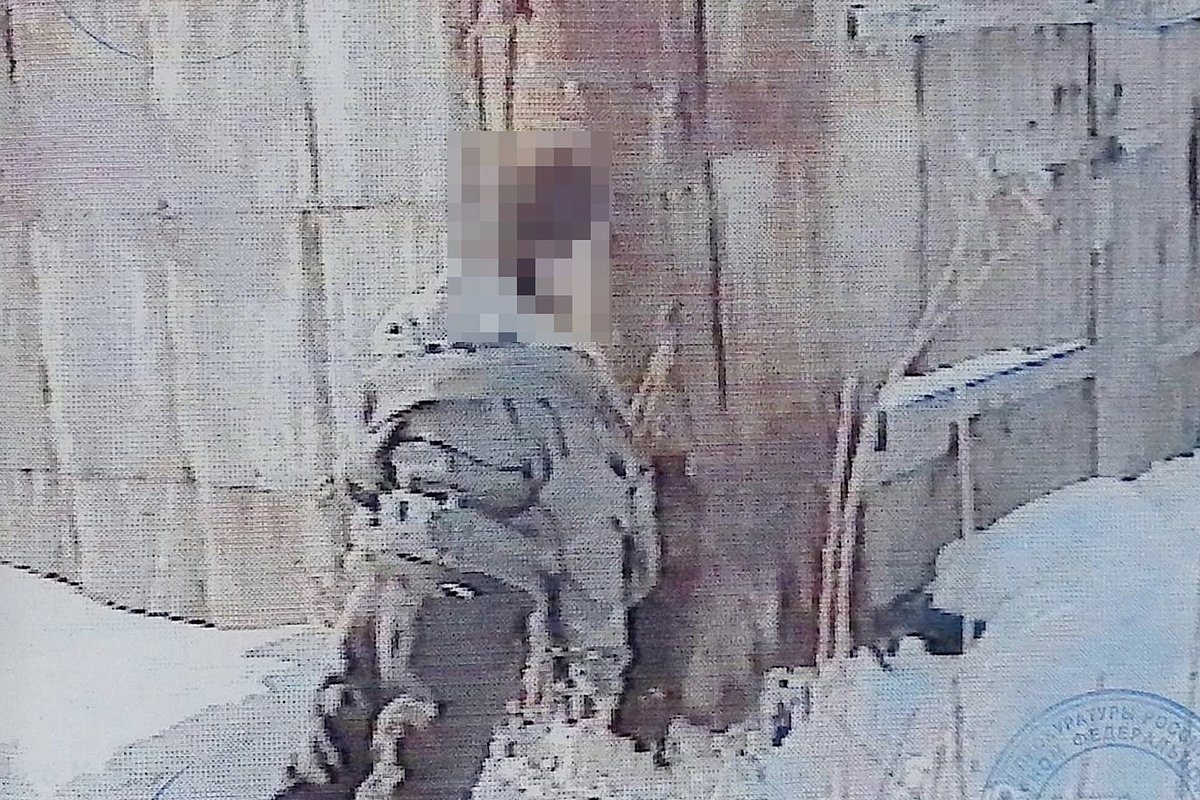 Тело Владимира Баженко, найденное среди гаражей