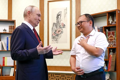 Путин повстречал взятого на руки 25 лет назад китайца