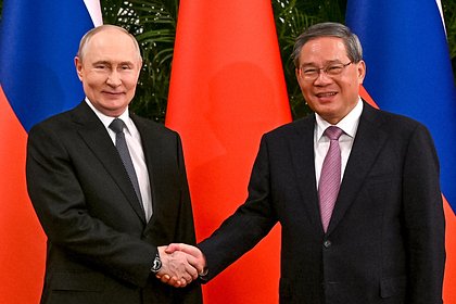 Путин встретился с премьером Госсовета Китая